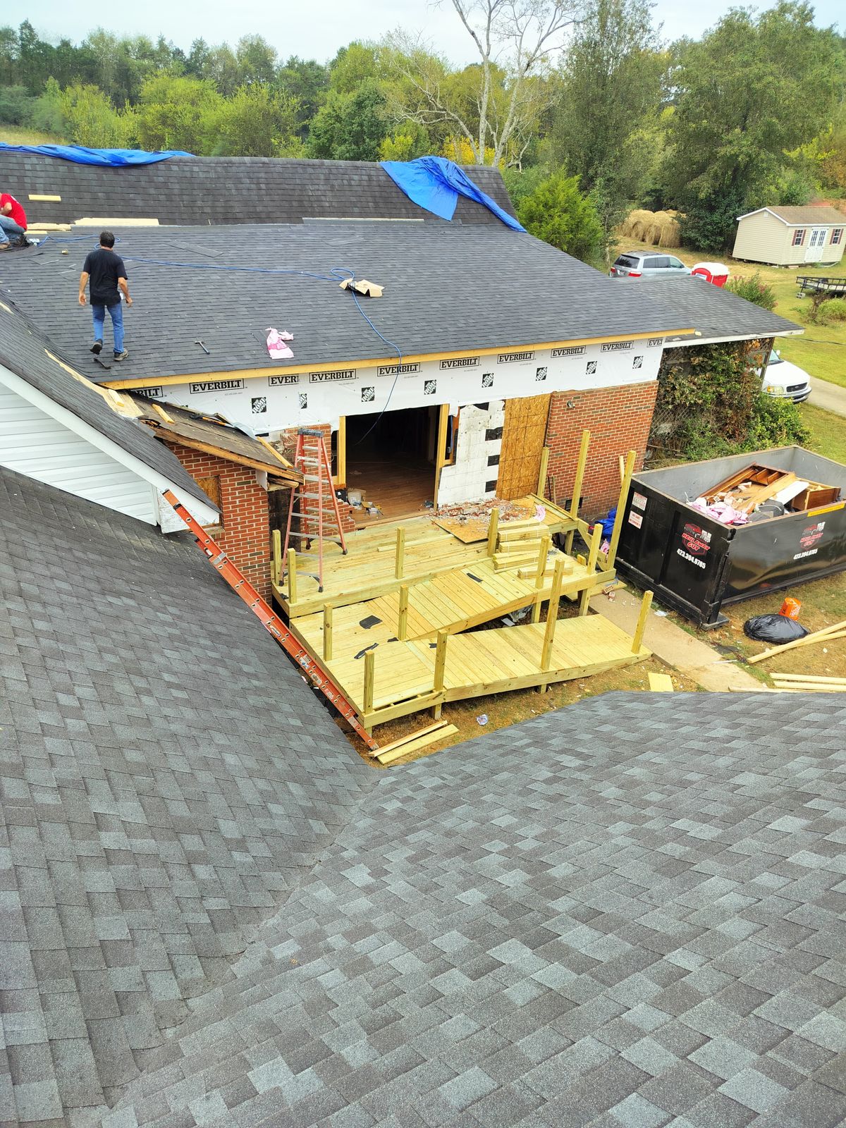 Garage addition framing and roofing in progress